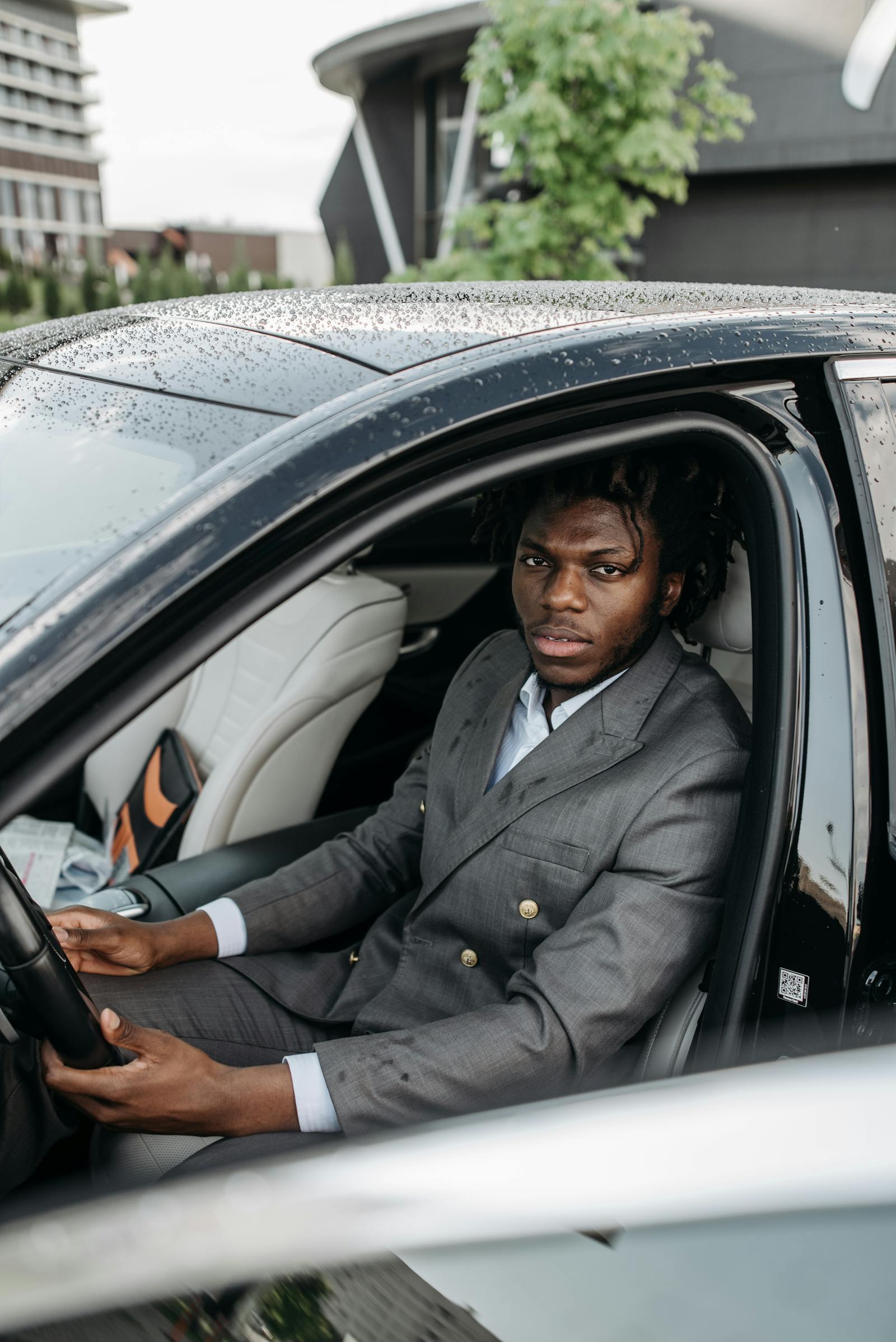 Executive in luxury black SUV — airport transfer